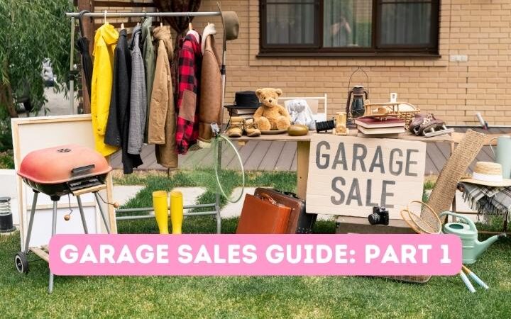 garage sale sign, color clothes on a rack, bbq grill, kitchen stuff on table