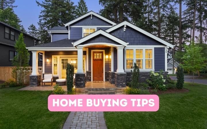 blue house with white trip and red door on a green lawn with brick pathway at dusk. Text: Home Buying Tips